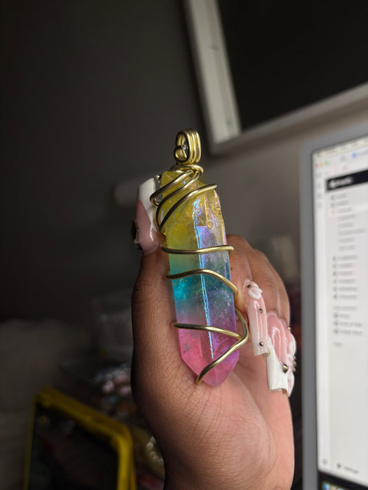 Aura wrapped crystal ( comes with rope chain )